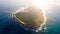 Stunning aerial drone sunrise view of Rabbit Island MÄnana Island, an uninhabited islet located 1.2 km off KaupÅ Beach & Waimana